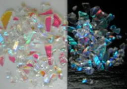 CBS_Pink_Teal_Dichroic_Frit_1oz_On_Black_Glass_COE96.jpg